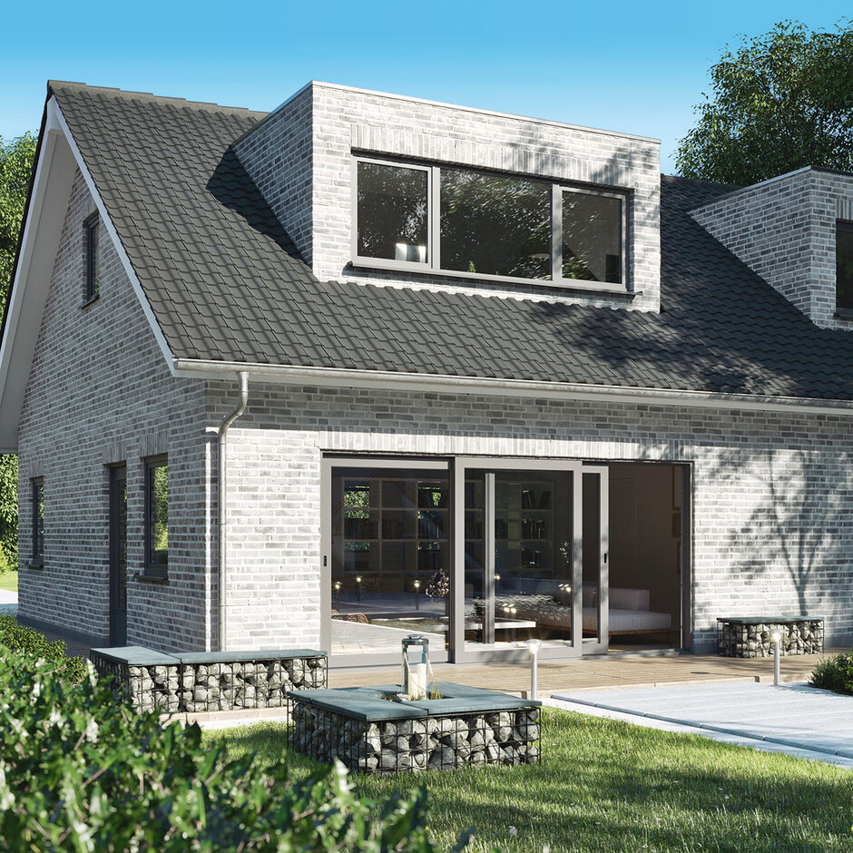 Eine Schiebetür verbindet den Wohnraum mit dem Garten